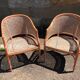 pair of gondola canned armchairs and their new cake