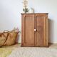 Small Parisian oak wardrobe with its porcelain knob.