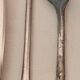 Set of mismatched silvered metal cutlery