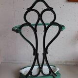 Old green cast iron umbrella stand