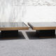Pair of coffee tables brass black glass