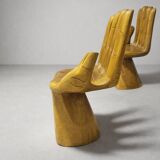 Sculptural armchair in solid wood – hand shape