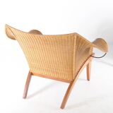 Pair of wooden and wicker armchairs