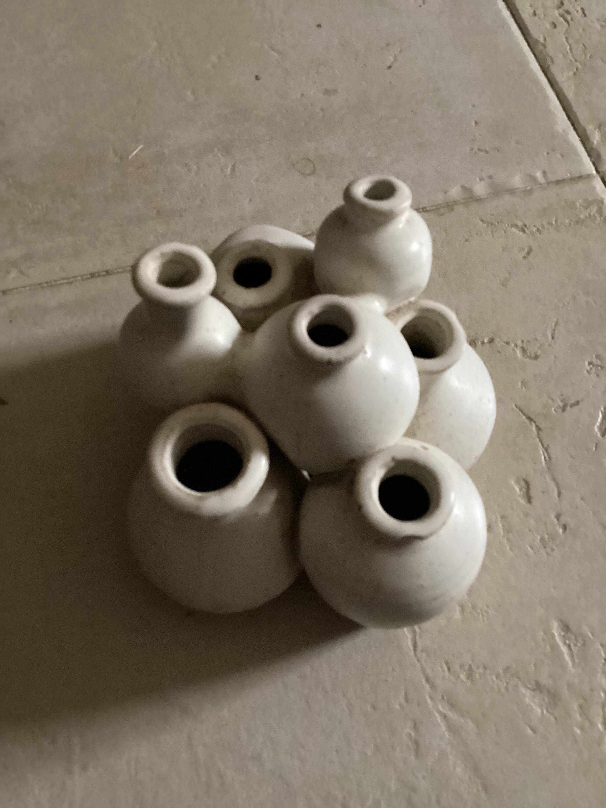 Beige ceramic flower pick