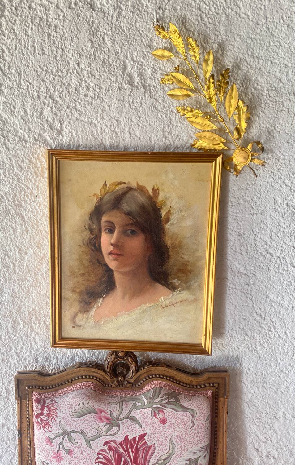 Portrait of a young woman with a laurel crown.