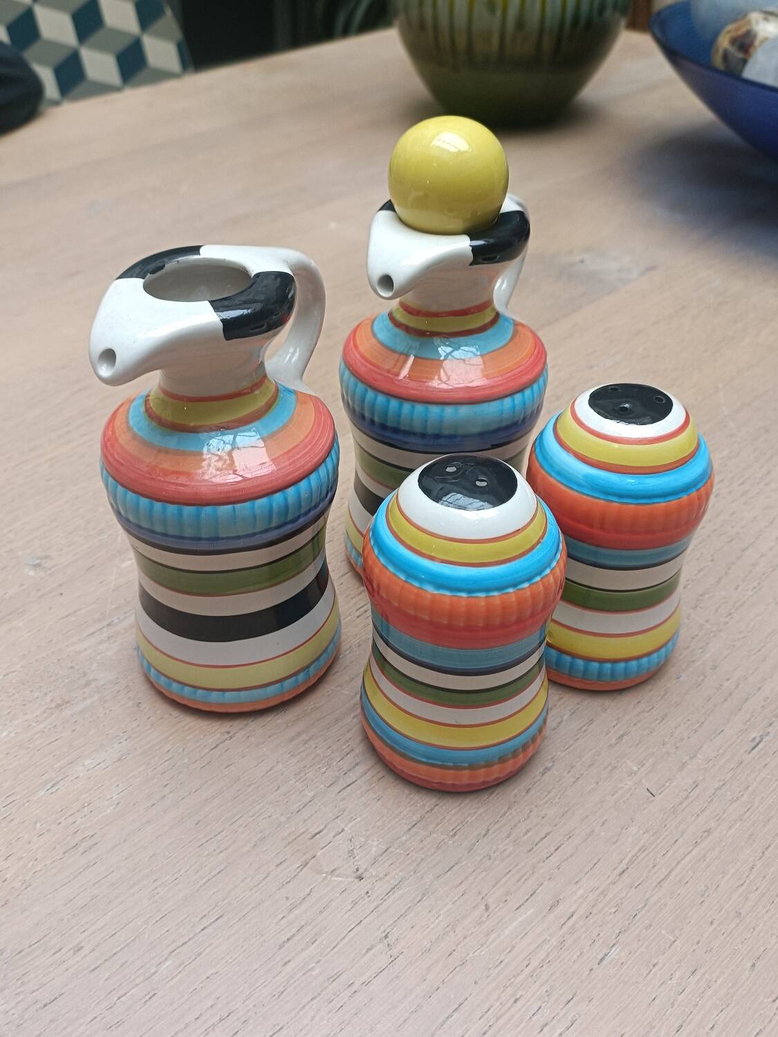 Vinegar and oil set, salt shaker and pepper shaker.