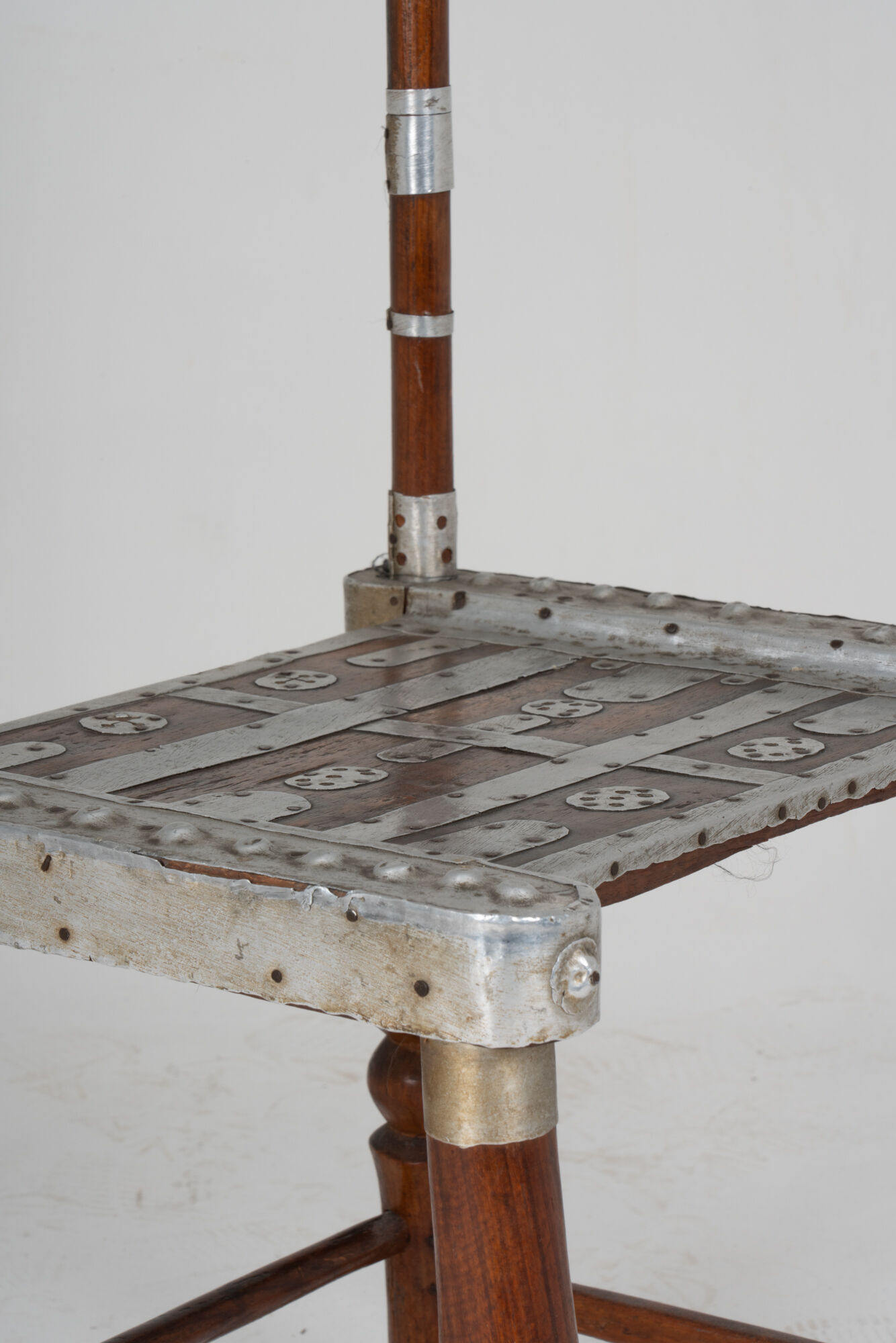 Chair decorated with hammered metal, 20th century