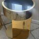 2 bedside tables and a brass Fendi table.