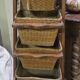 Meuble de rangement rustique en bois massif avec paniers en osier / vintage XXeme siecle
