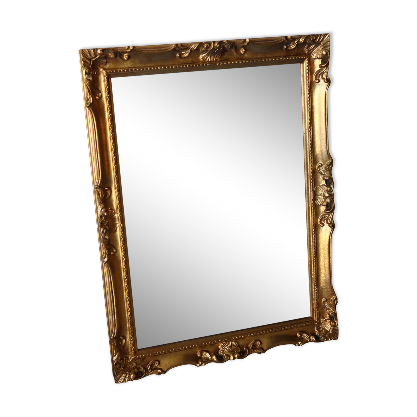 Bevelled gilded wood mirror