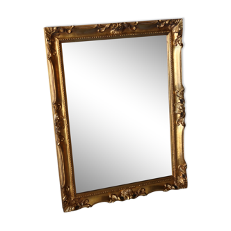 Bevelled gilded wood mirror