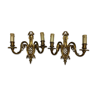 Pair of classic wall lamps in gilded bronze