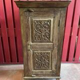 India. Bonnetière with a teak door finely carved by hand.