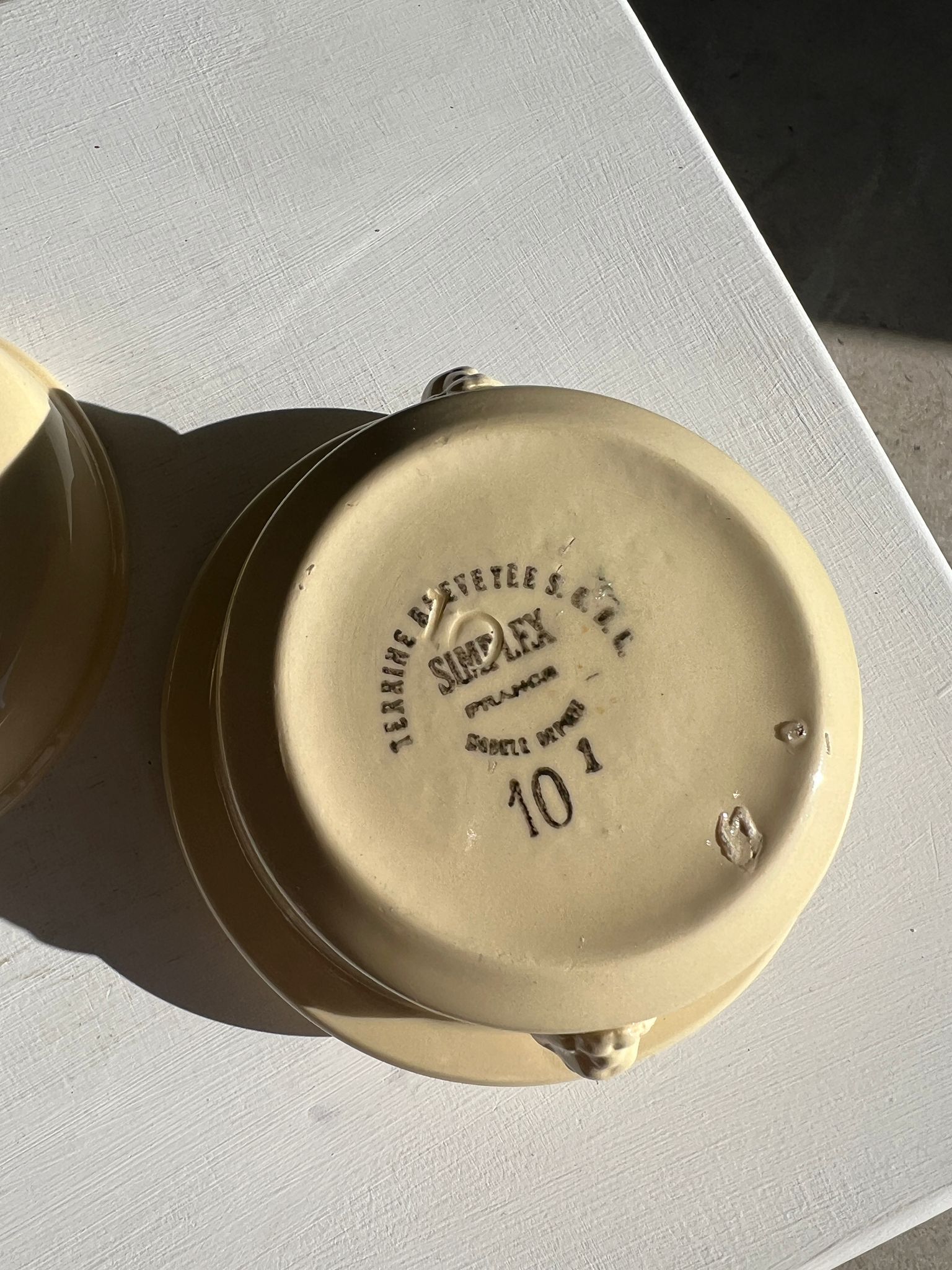 Glazed light yellow ceramic terrine