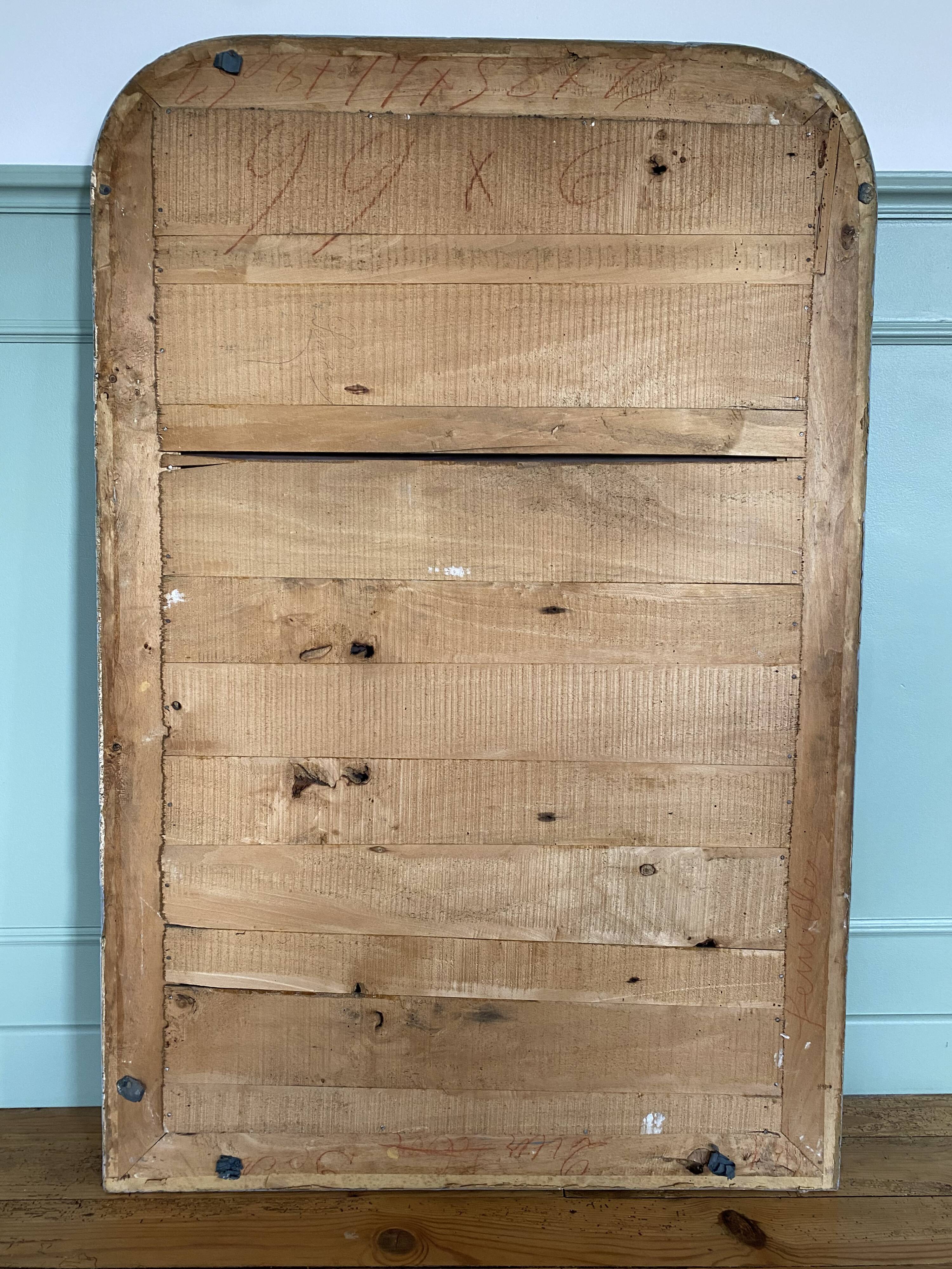 Louis-Philippe mirror gilded with silver leaf