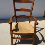 Grandfather's armchair in wood and straw.