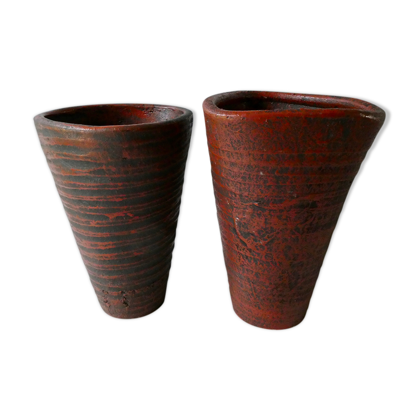 Pair of red enamelled terracotta vases, signed