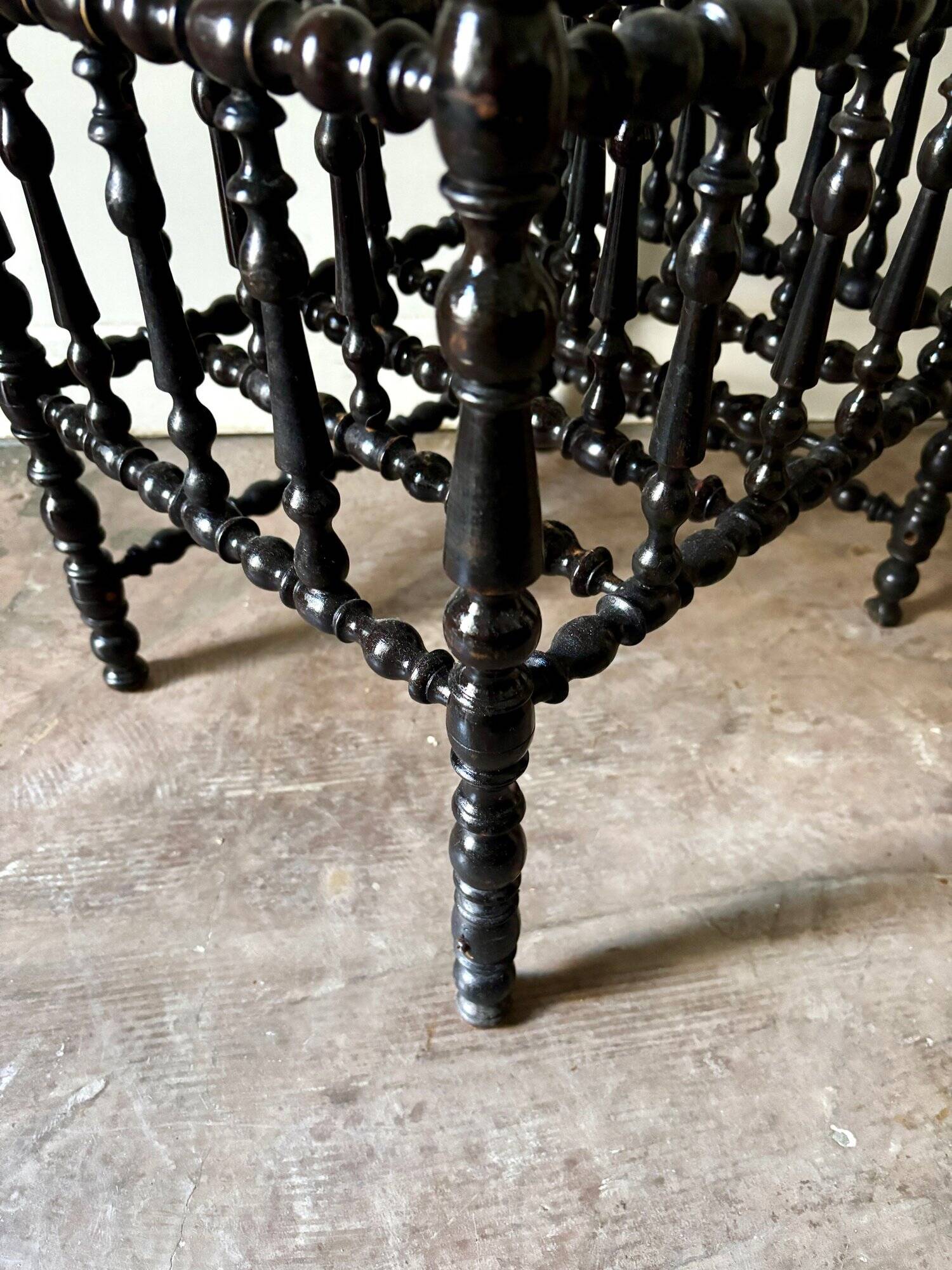 Napoleon III magazine rack in black turned wood