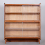 Restored midcentury oak bookcase, glass doors, revived polish, czechia, 1950s
