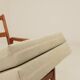 Vintage armchair in olive corduroy with a wooden frame.