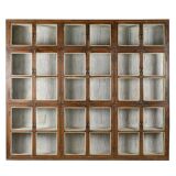 Large display case in old patinated teak