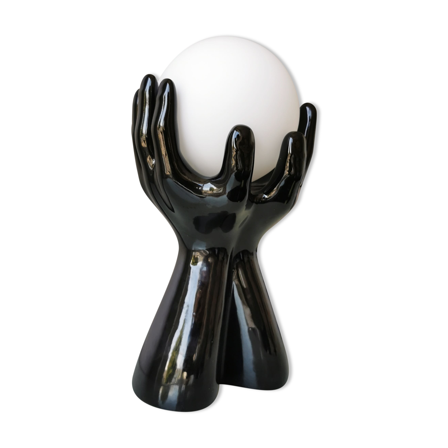 Italian design ceramic table lamp, two hands and glass shade.