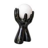 Italian design ceramic table lamp, two hands and glass shade.