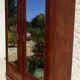 Armoire ancienne 2 portes miroir en marqueterie de bois