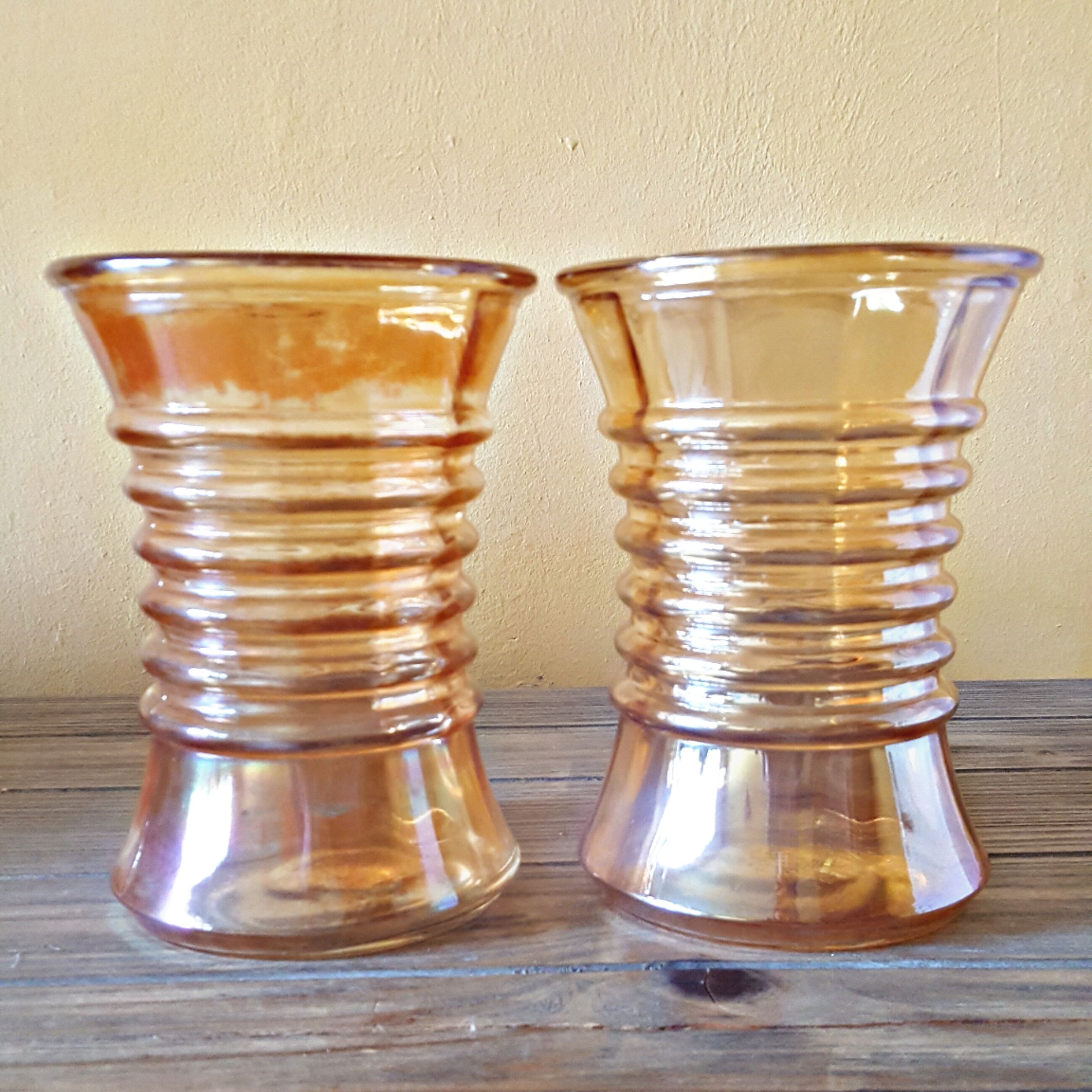 Pair of vintage orange-colored glass vases