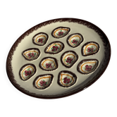 Large circular platter with compartments for shellfish, molluscs, and oysters.