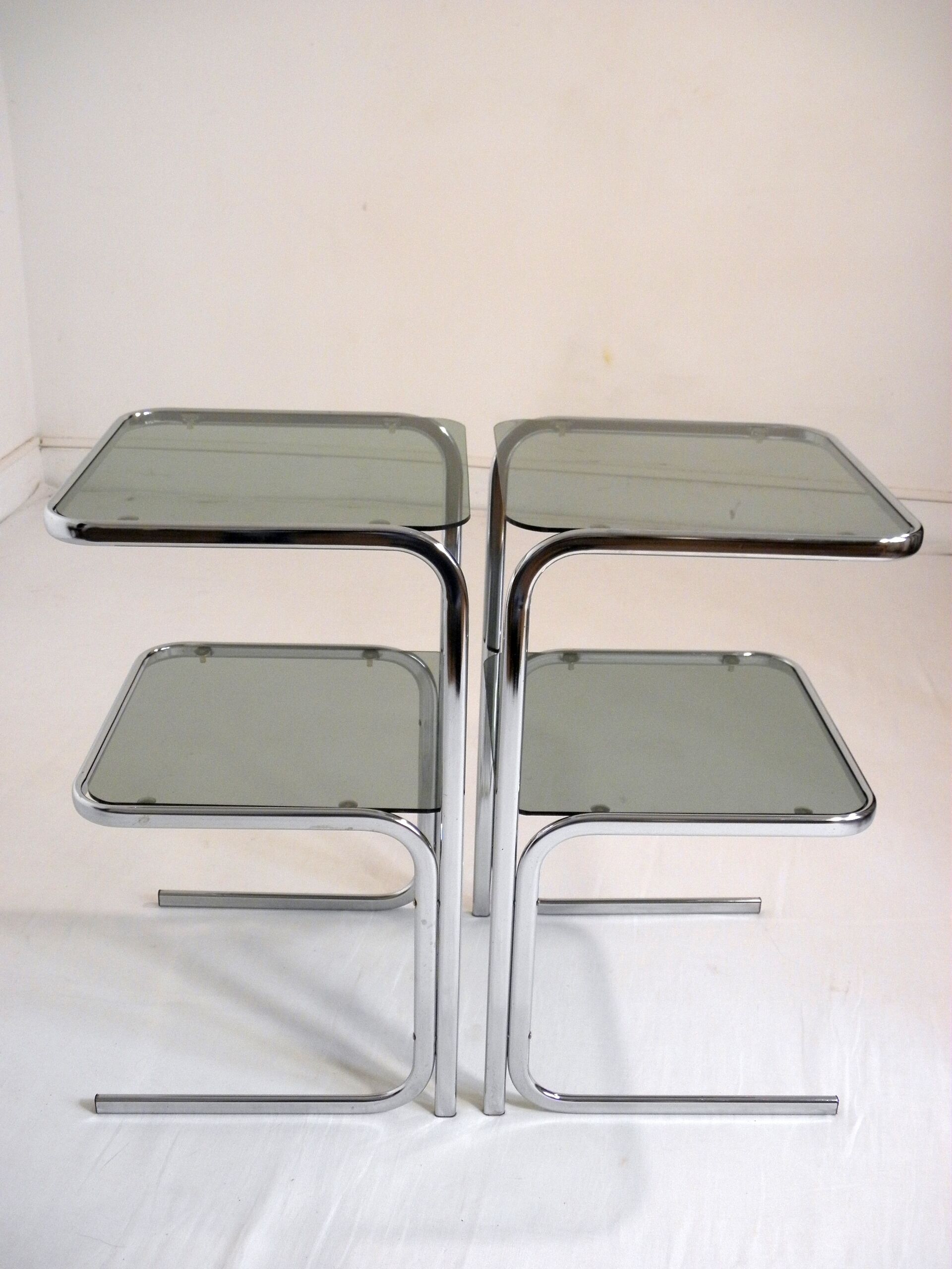 Pair of chrome bedside and 70s glass