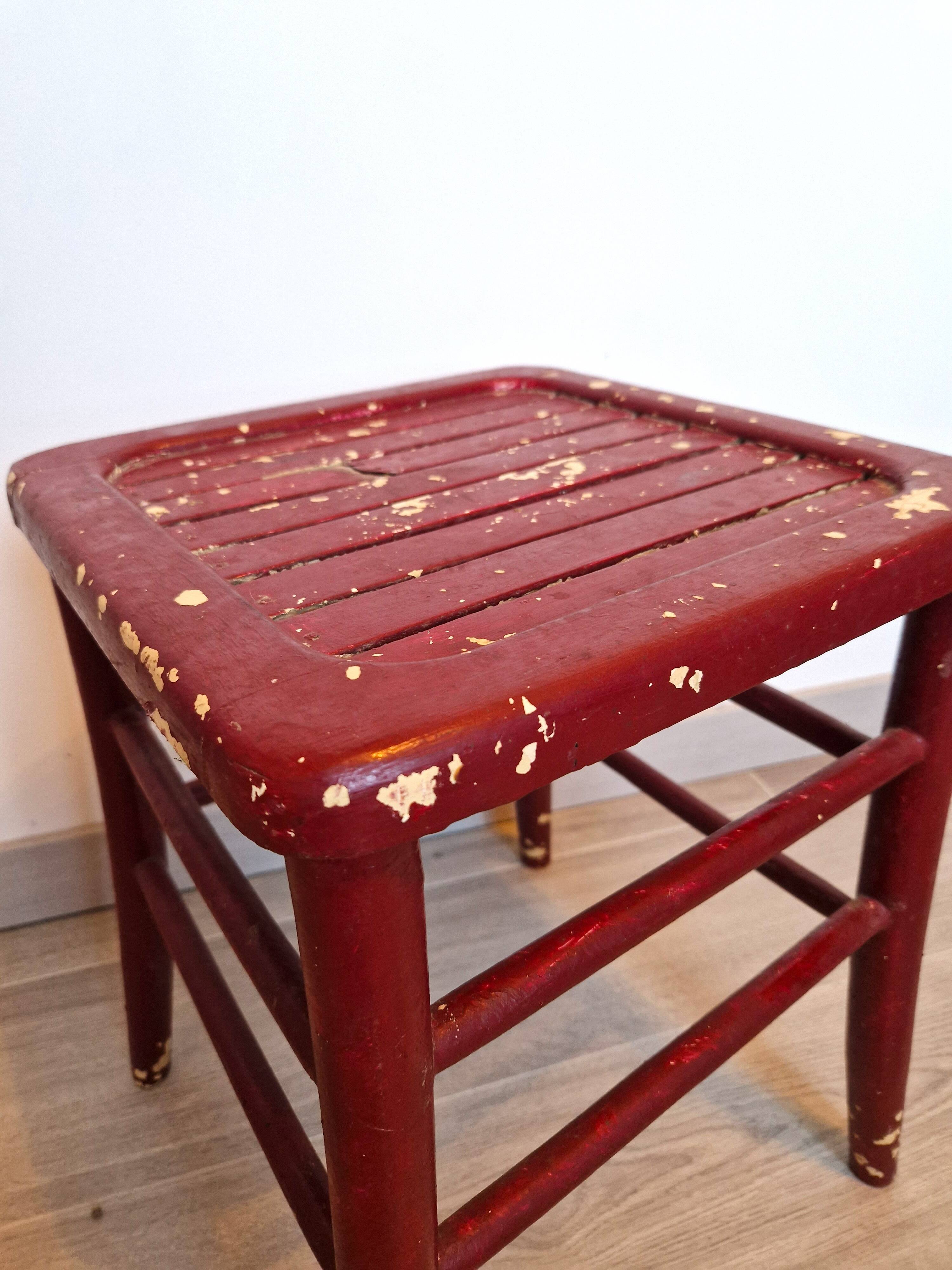 Antique square stool in red wood, workshop patina