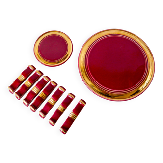 set of trivets, bottle coasters and knife holders in art de cherry-colored ceramic
