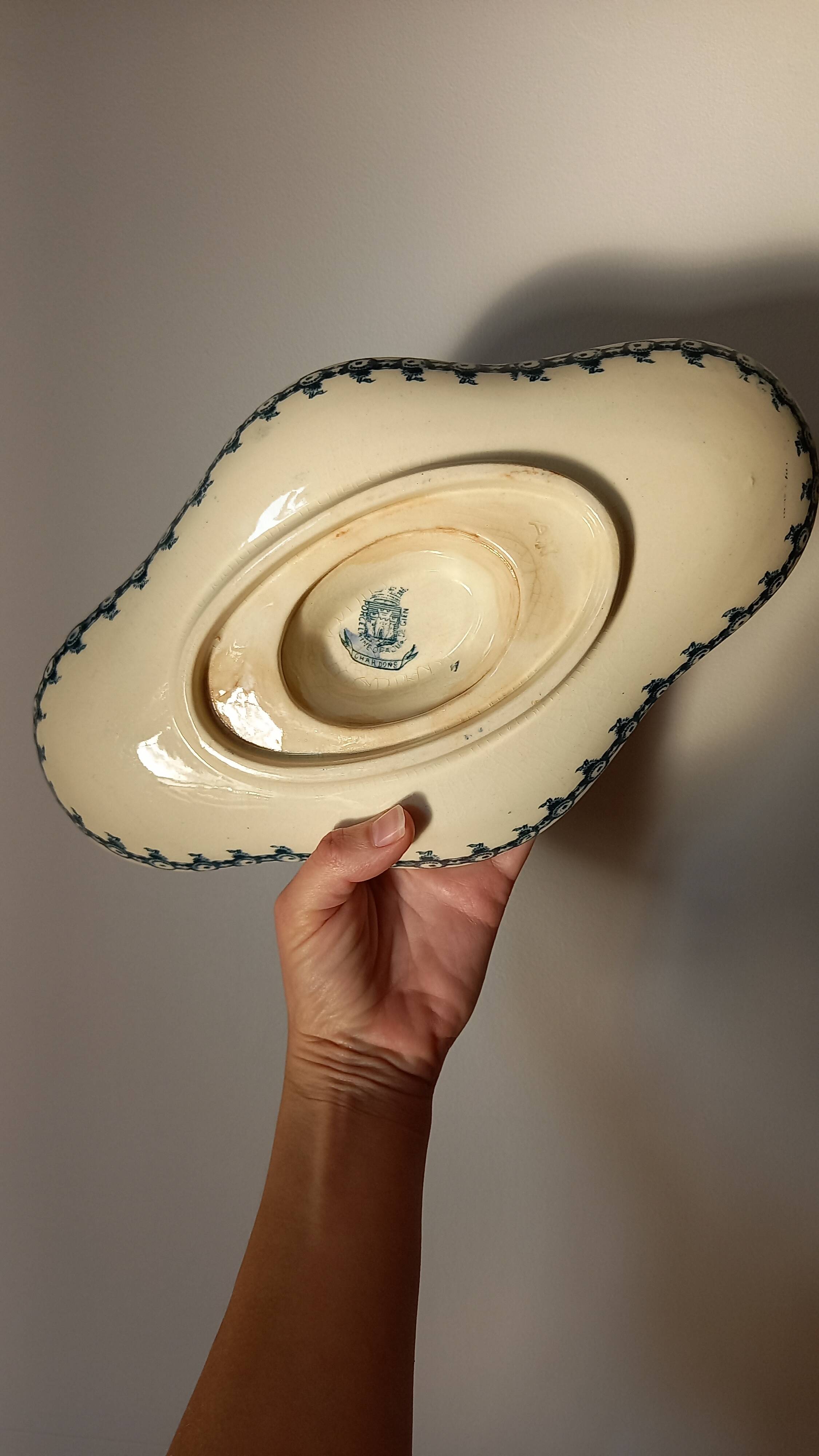 Old gravy boat on frame in terre de fer earthenware by gien, “chardons” model in blue-green