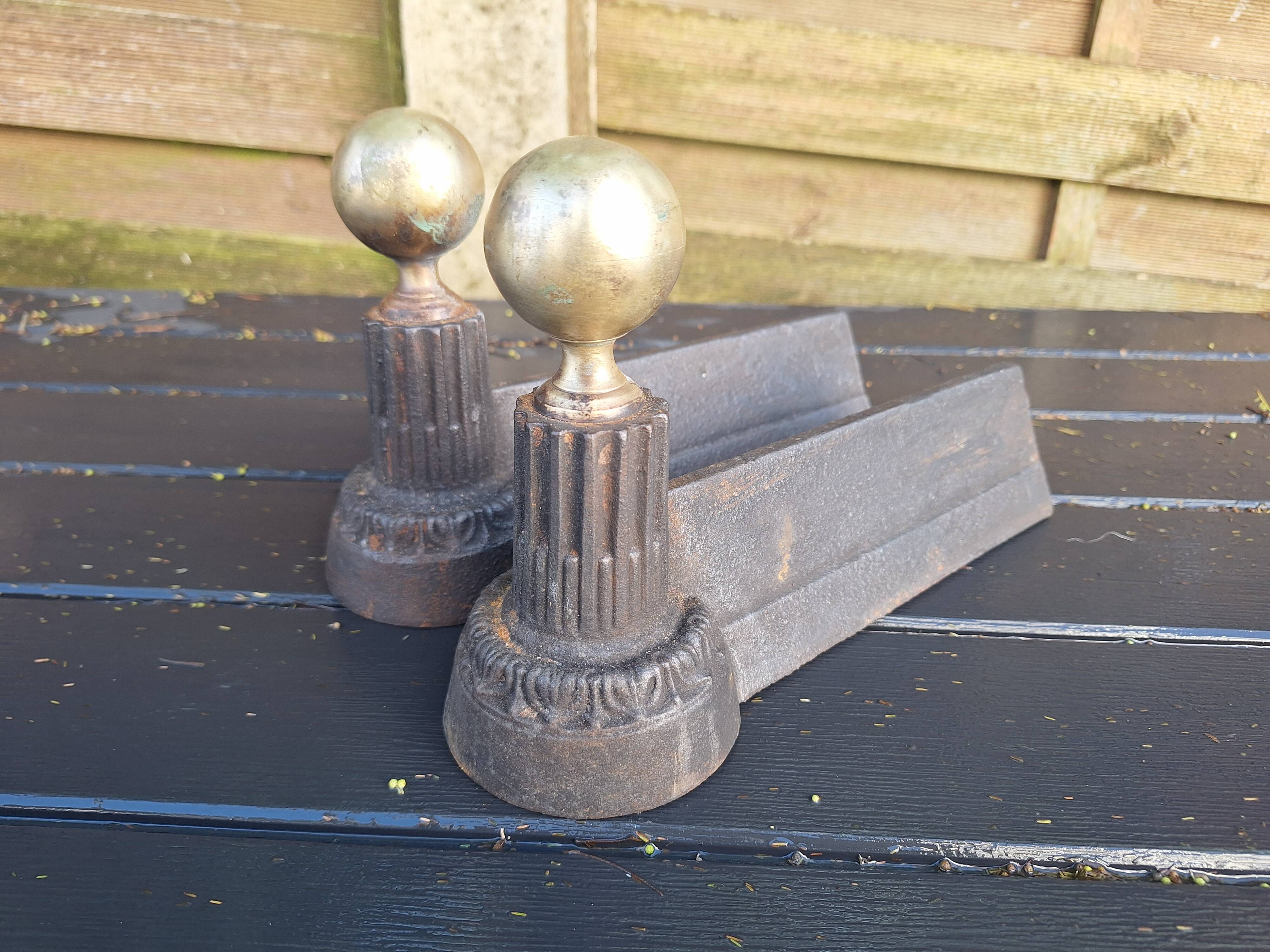 Small Napoleon III cast iron and brass andirons