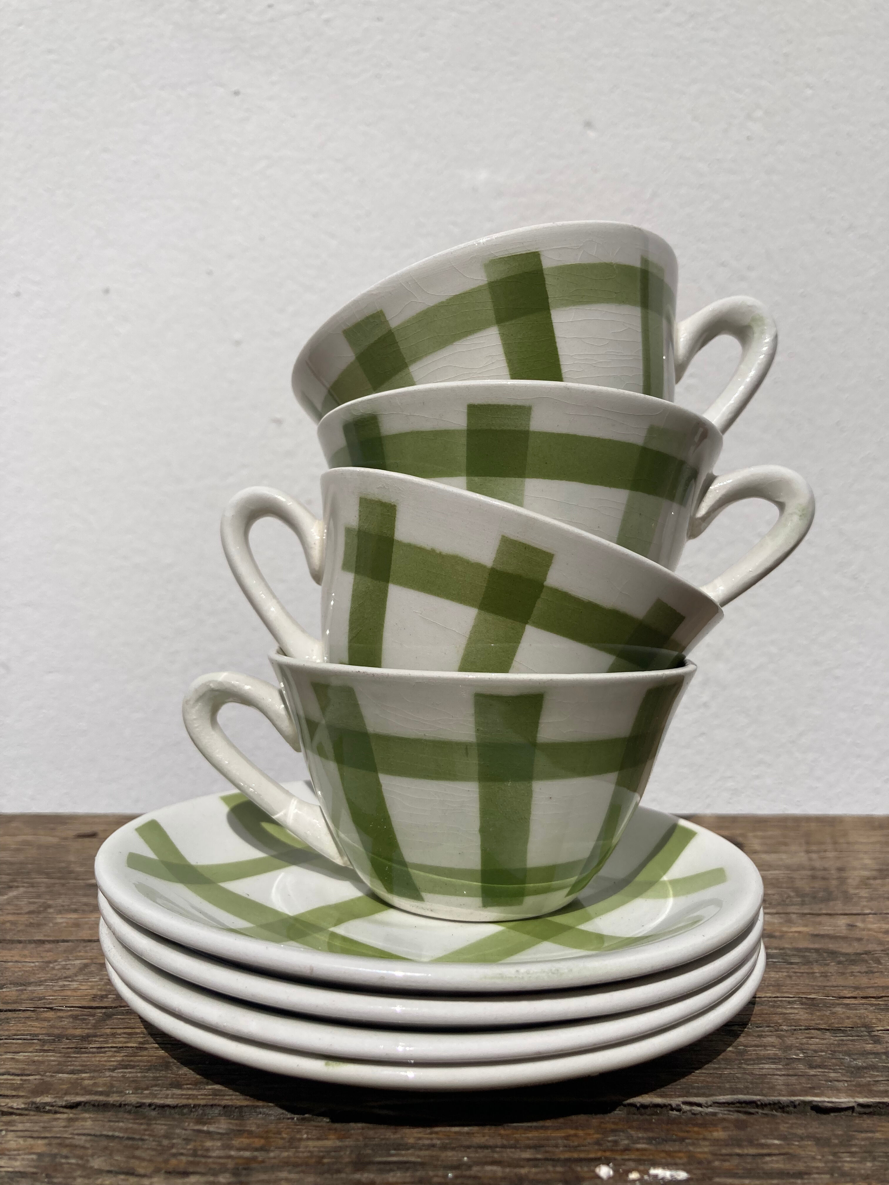 4 coffee cups Green and white checkered wolf grinders
