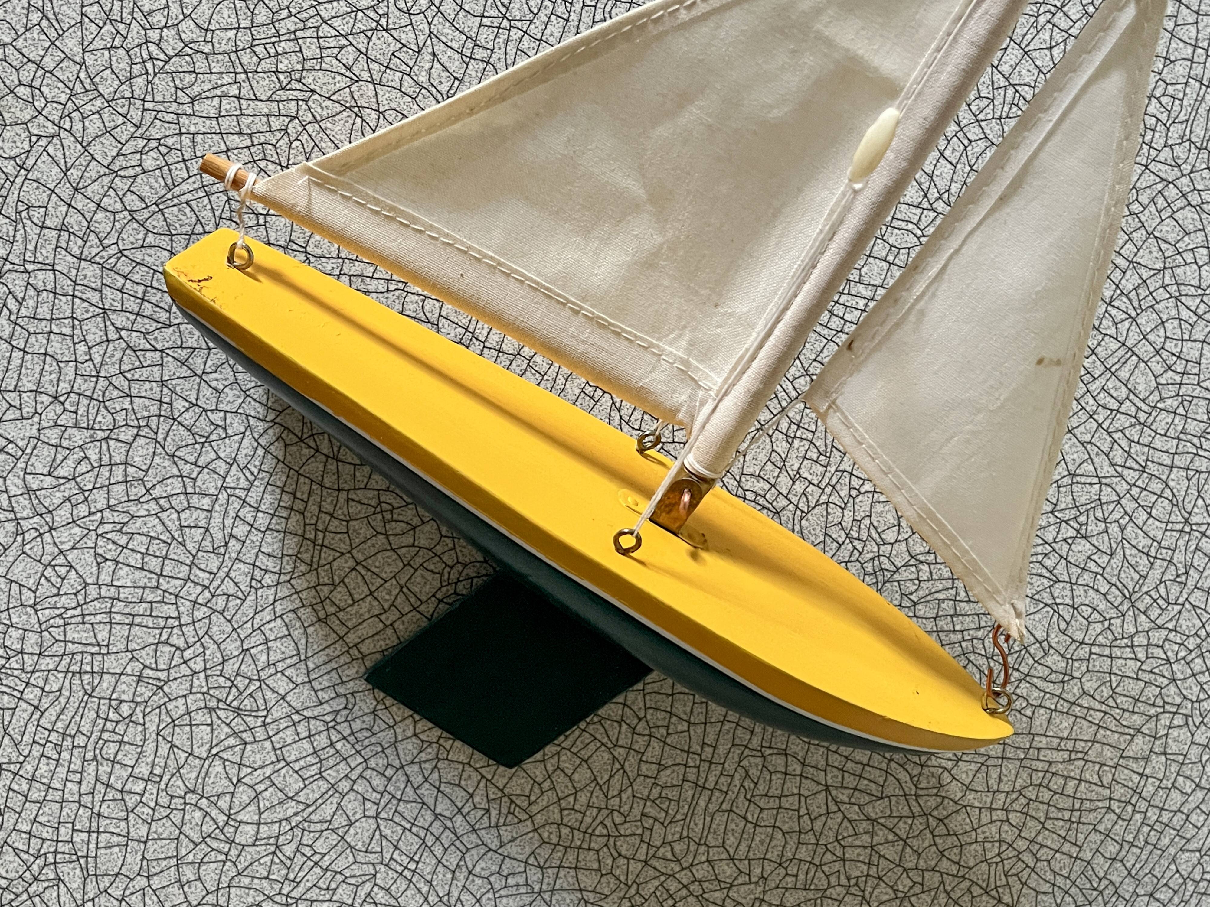 Small wooden sailboat, pretty colors