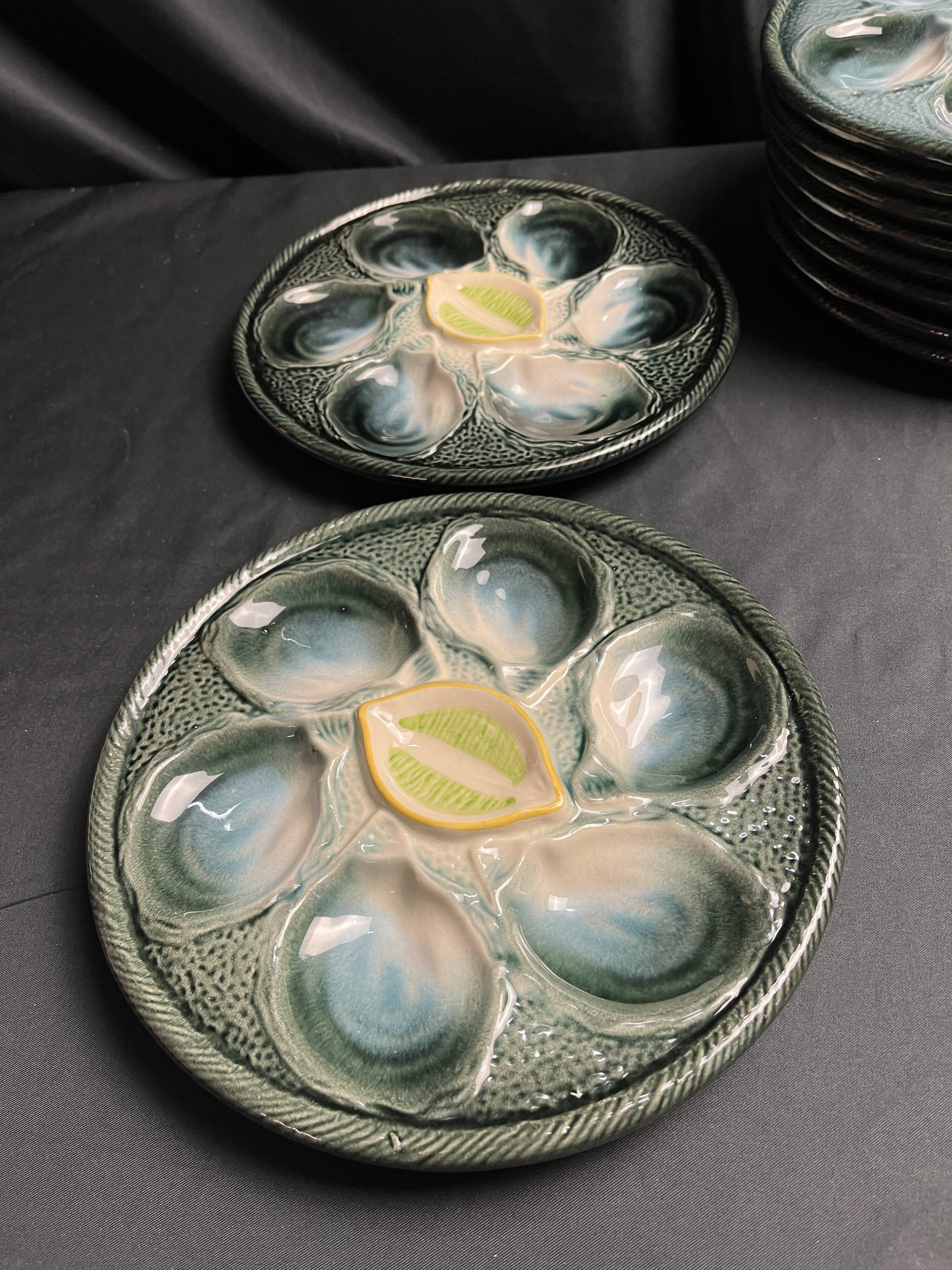 Set of 10 Saint Clément oyster barbotine plates circa 1940