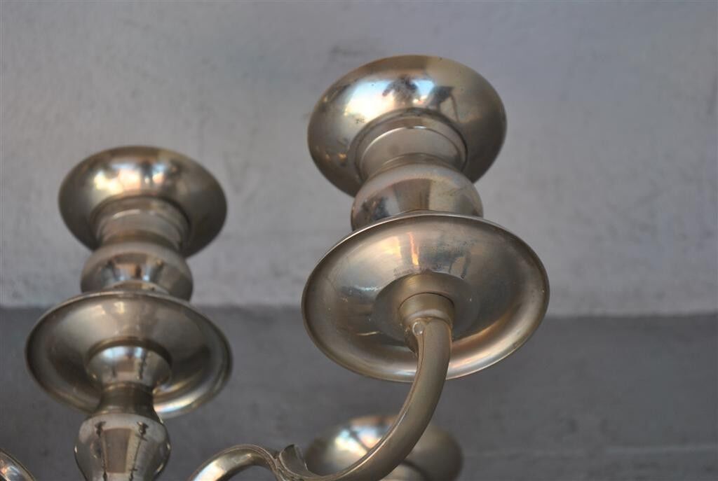 Pair of candlesticks on silver feet