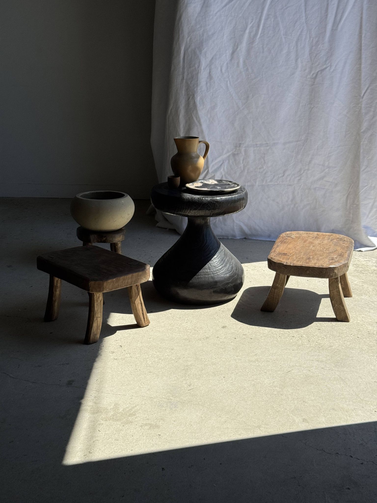 Small stool, rectangular rounded solid teak side table.
