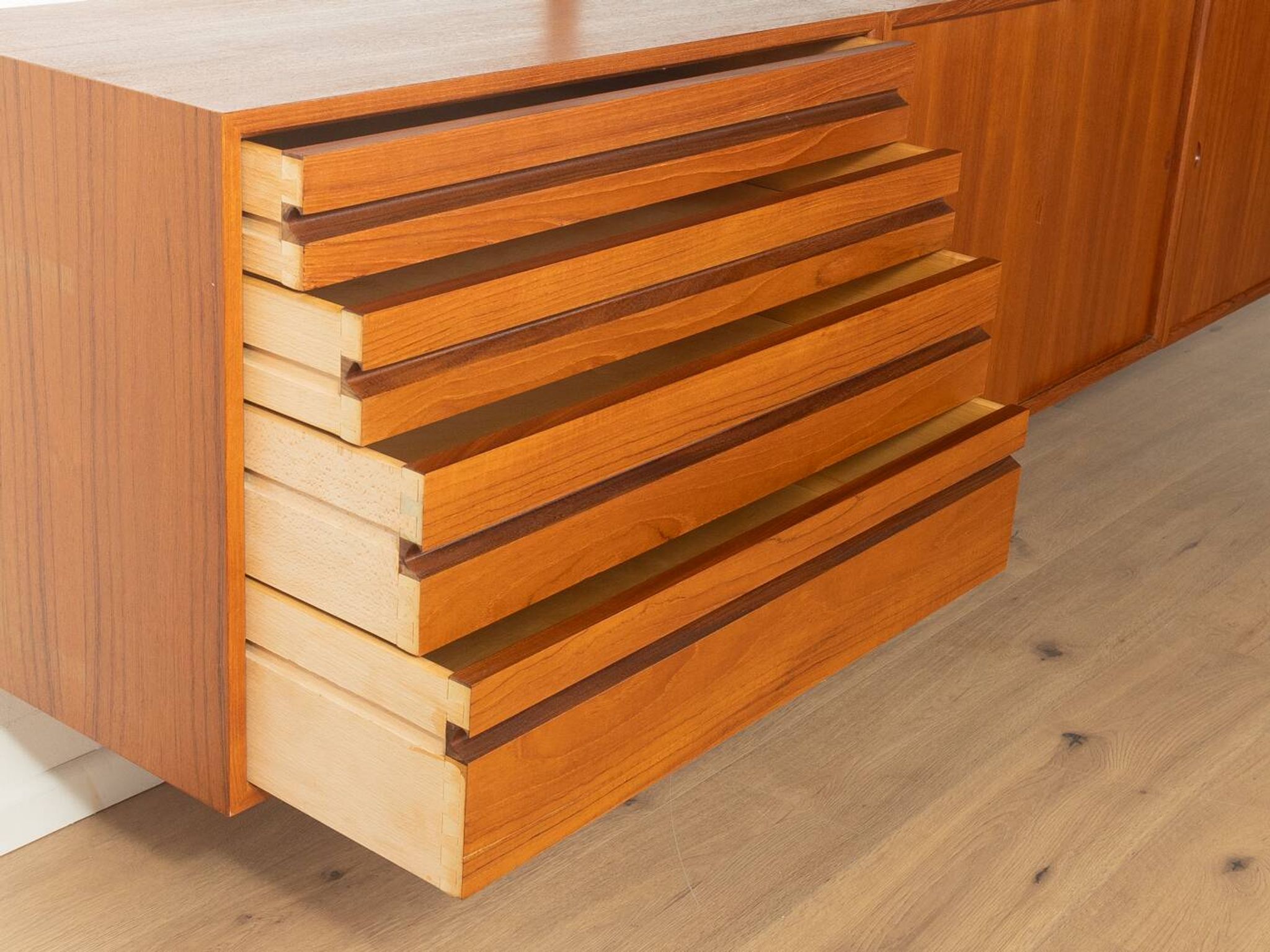 Classic shelving system from the 1960s in teak veneer by Poul Cadovius for Cado