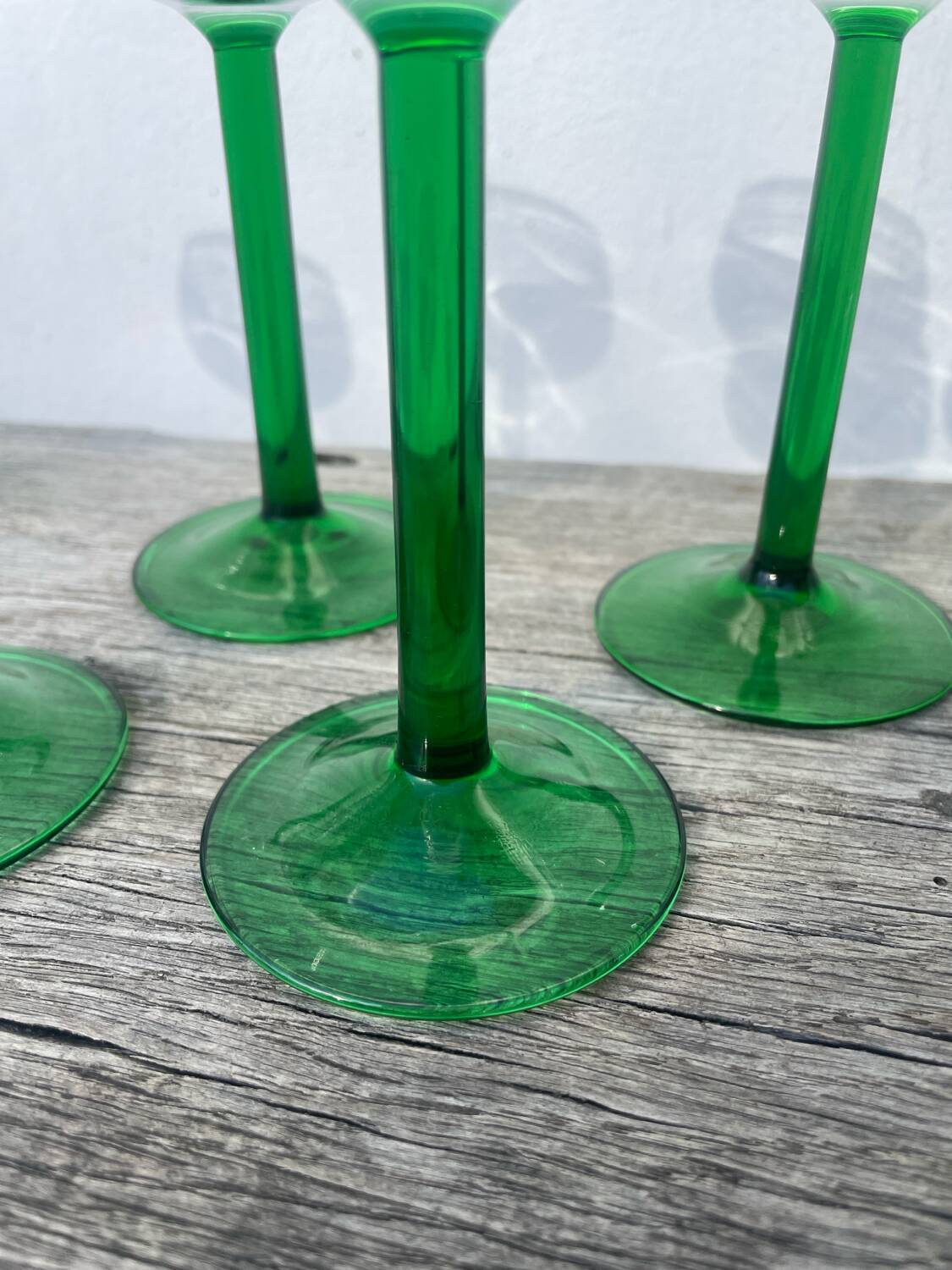 7 green glass stemmed glasses