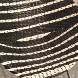 Black and white basket armchair