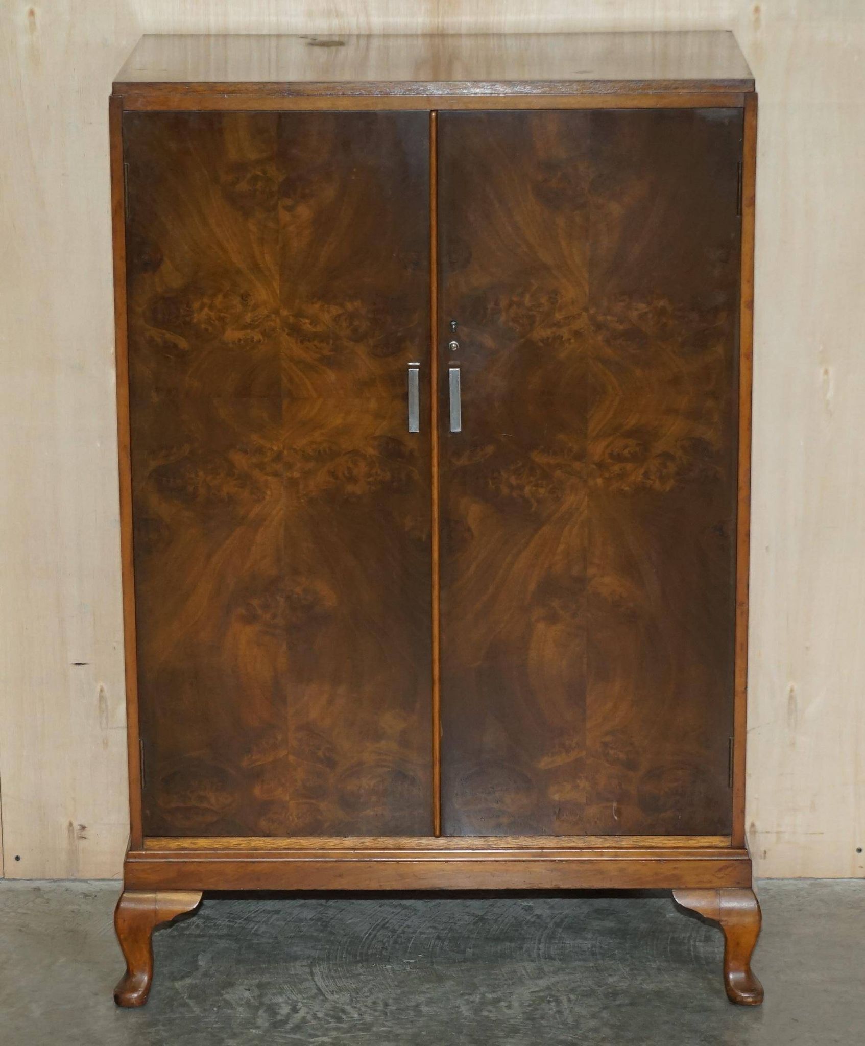 Art Deco governess wardrobe in burr walnut by Waring & Gillow
