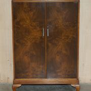 Art Deco governess wardrobe in burr walnut by Waring & Gillow