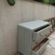 1950s commode enhanced in verdigris.