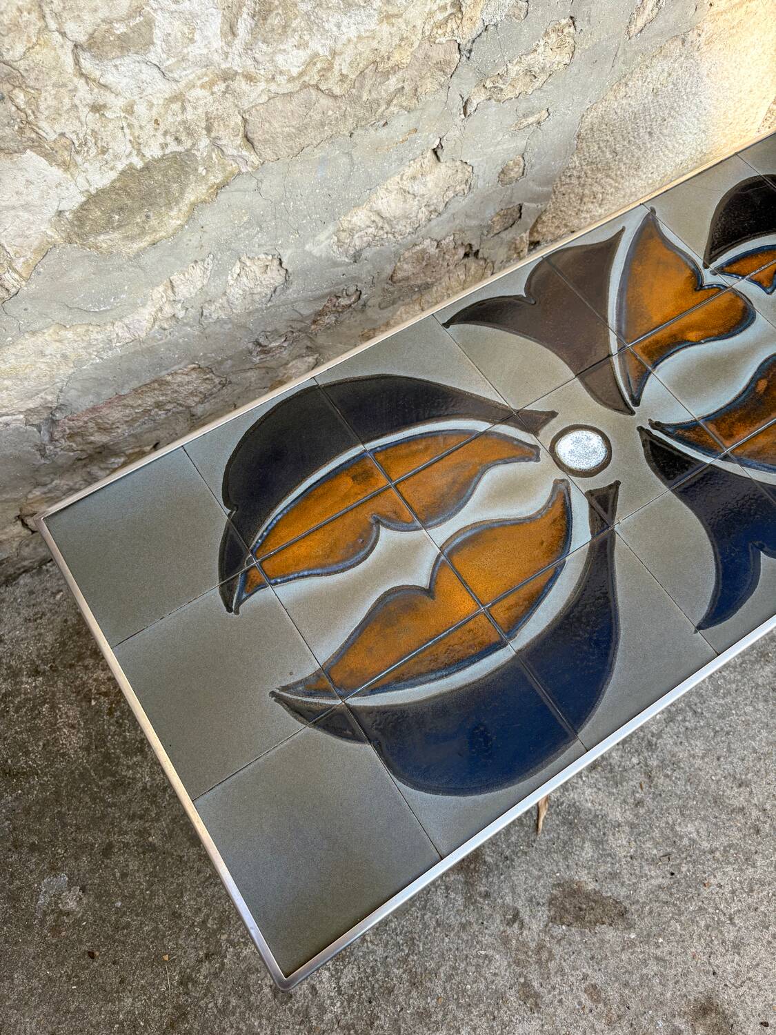 Vintage 1970s ceramic tile coffee table with chrome legs.
