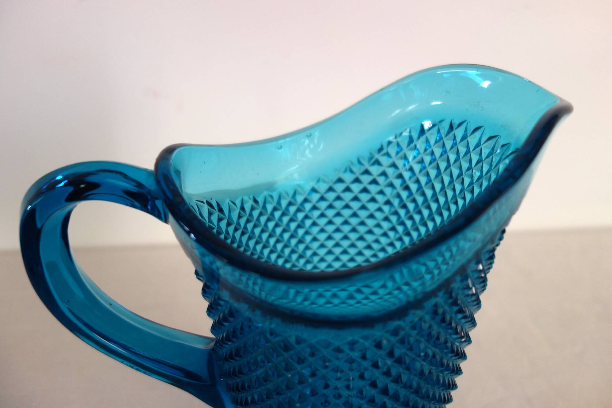 Vintage cut glass blue pitcher