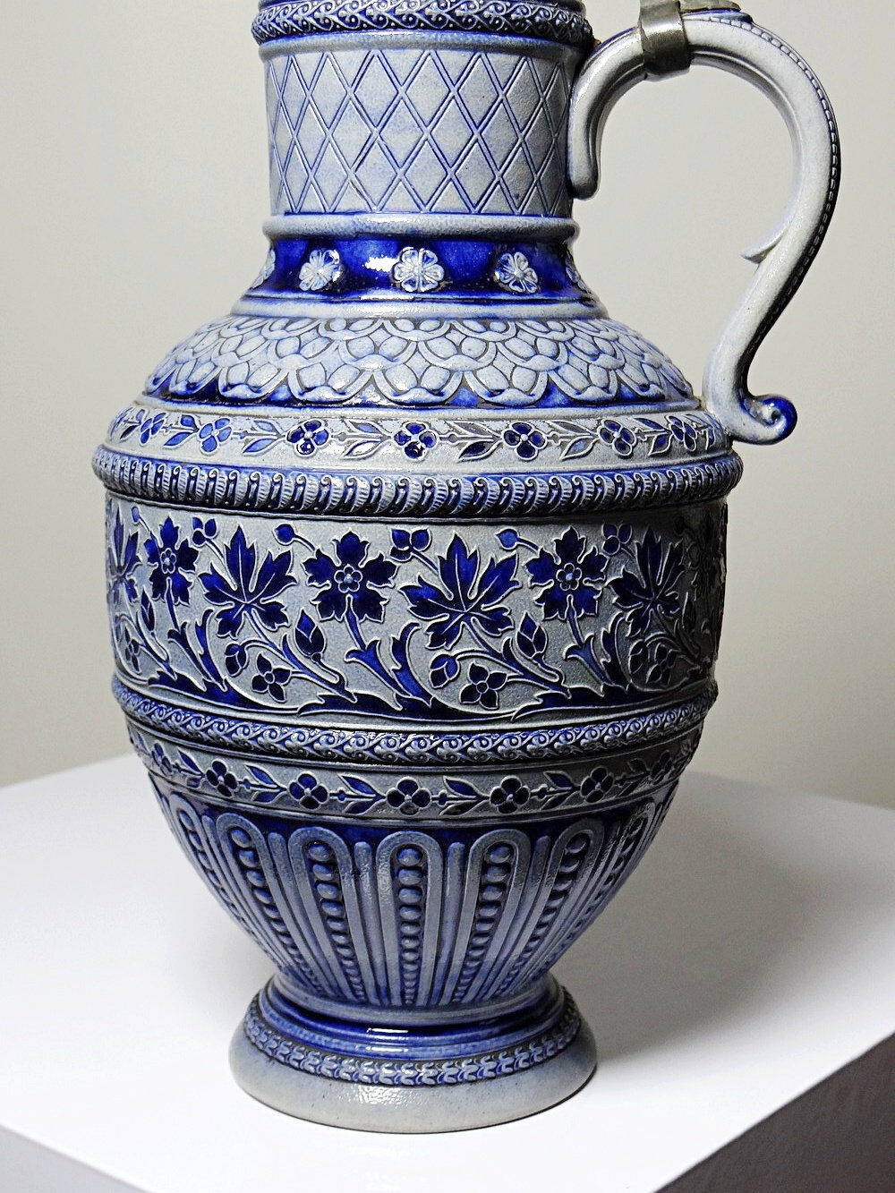 Large salt-glazed stoneware beer jug with tin, Germany, Westerwald type.