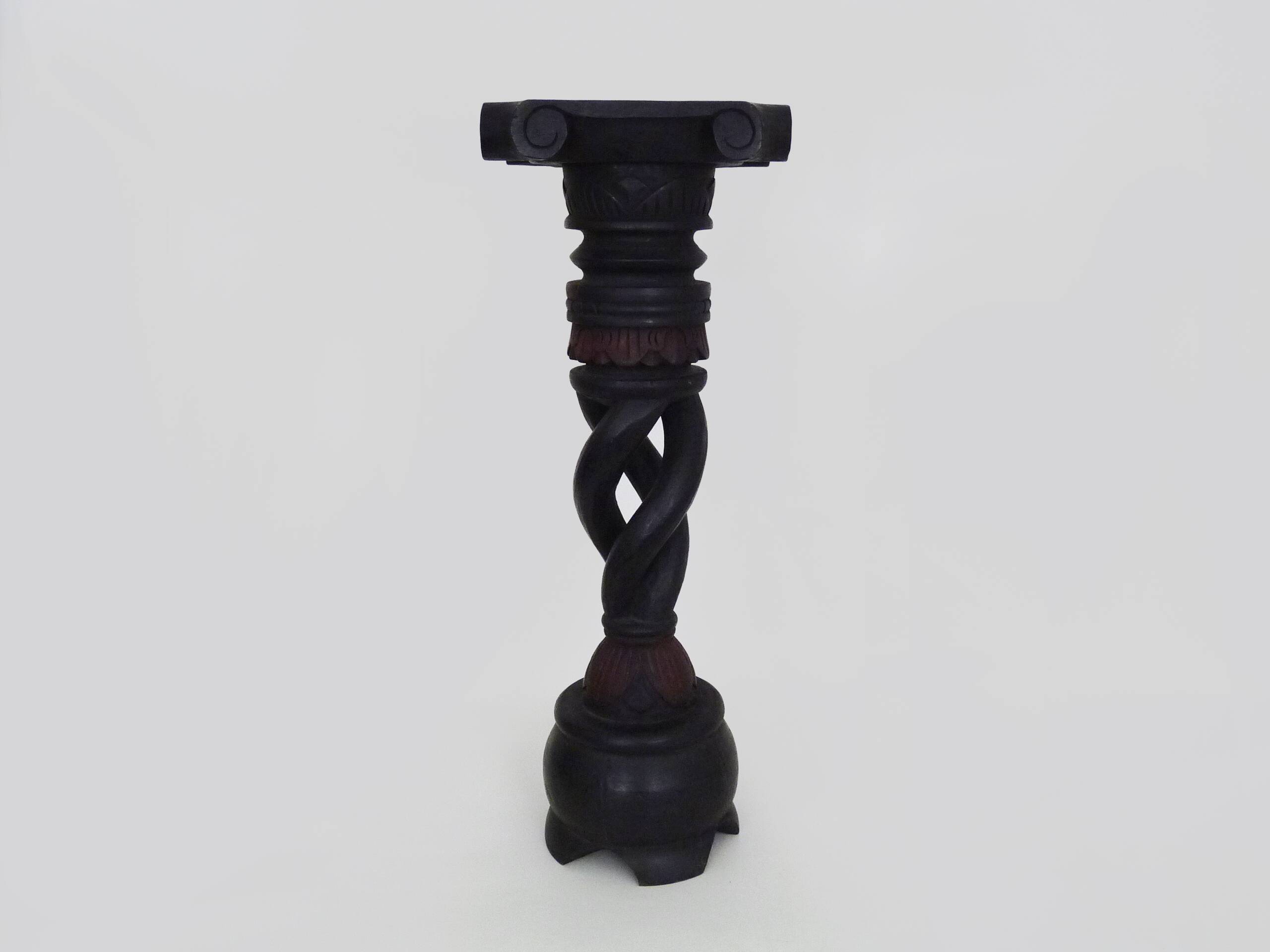 Twisted and engraved blackened wooden pedestal. 1960s 70s.